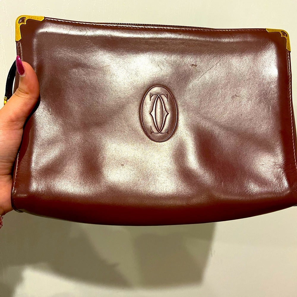 Cartier big pouch purse. Beautiful cherry color.
